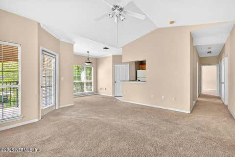 Photo of 10961 BURNT MILL Road #1328, Jacksonville, FL 32256 (MLS # 2160136)