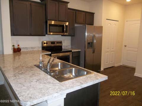 Photo of 8073 ECHO SPRINGS Road, Jacksonville, FL 32256 (MLS # 2159594)