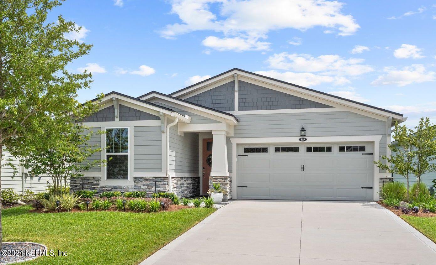 St Johns, FL home for sale located at 319 Juniper Hills Drive, St Johns, FL 32259
