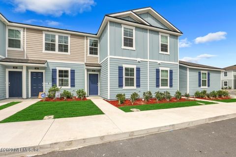 Photo of 448 RUNNING WOODS Street, Orange Park, FL 32065 (MLS # 2143321)