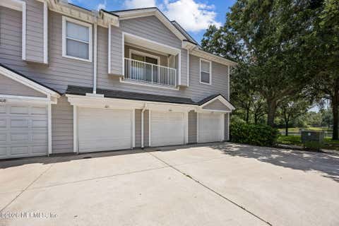 Photo of 7055 DEER LODGE Circle #106, Jacksonville, FL 32256 (MLS # 2156892)