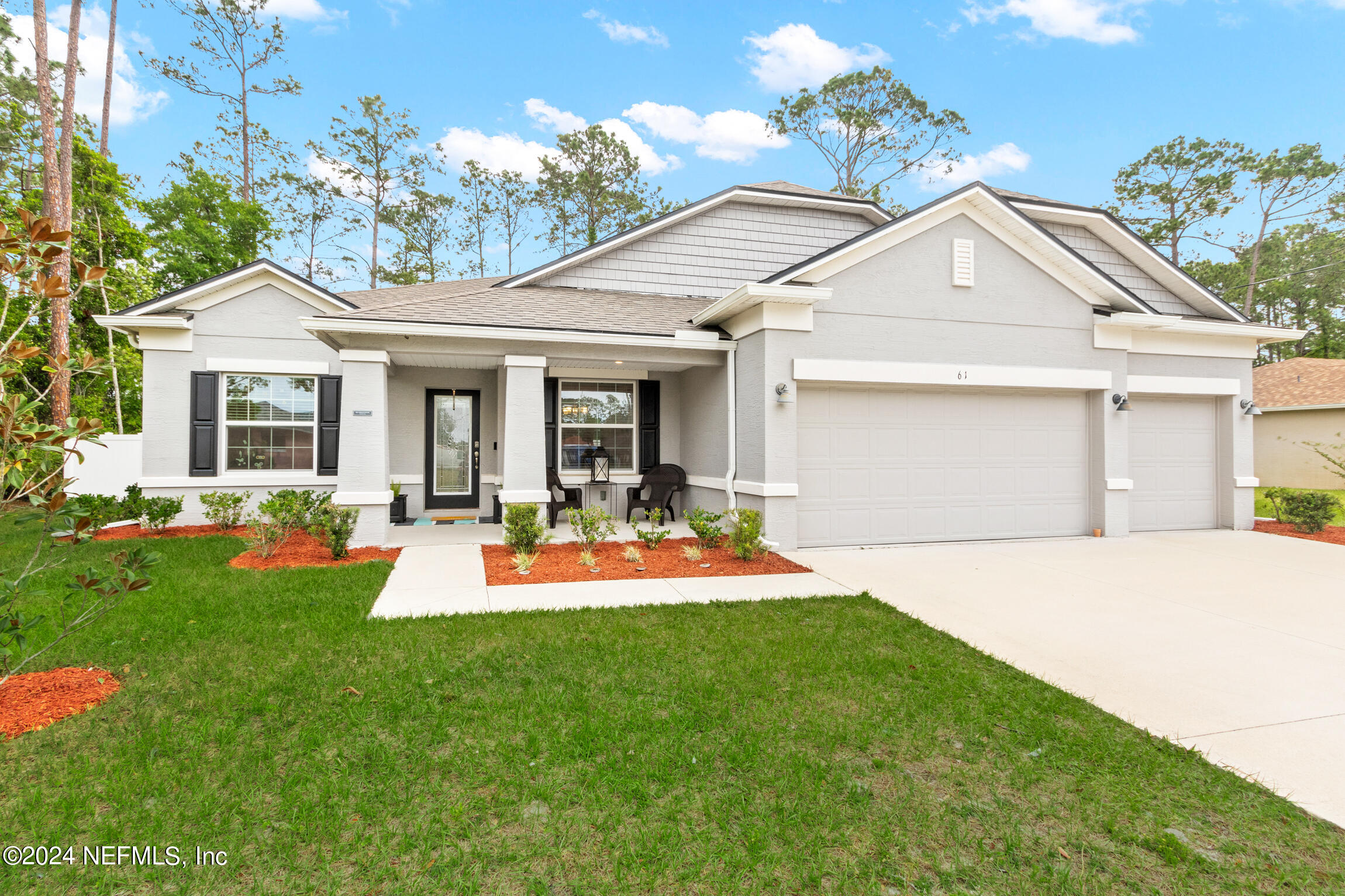 Palm Coast, FL home for sale located at 61 Woodfield Drive, Palm Coast, FL 32164