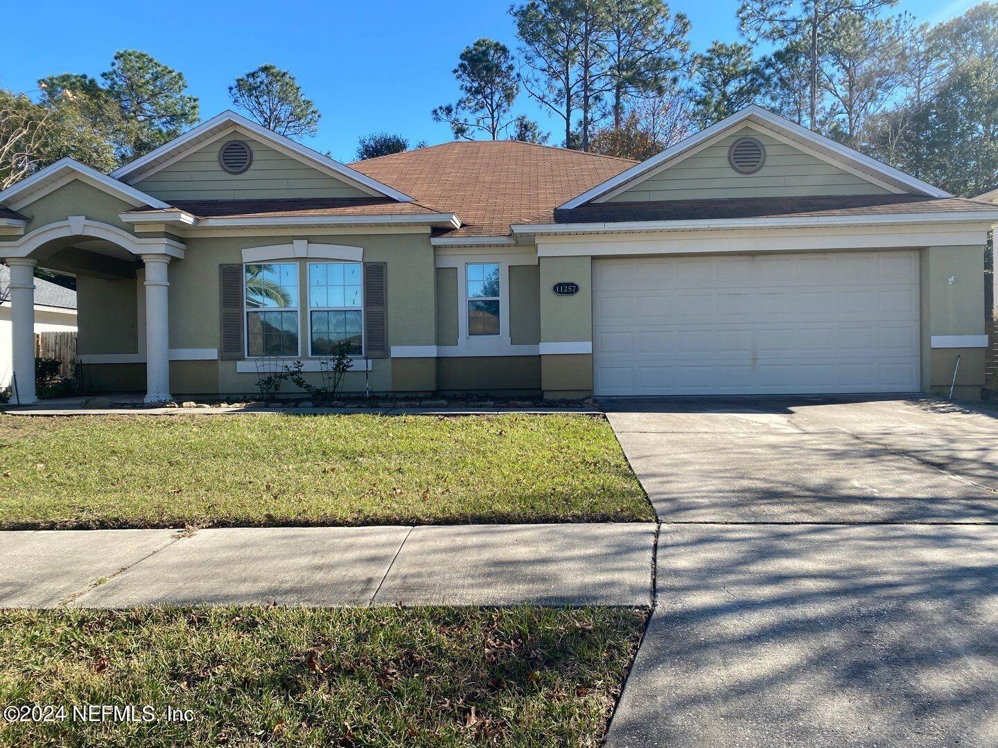 Jacksonville, FL home for sale located at 11257 Justin Oaks Drive N, Jacksonville, FL 32221