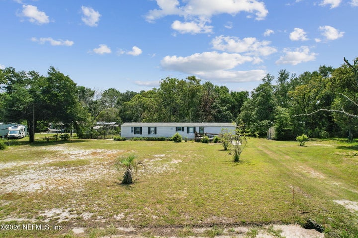 Photo 1 of 17 — 85374 TINYA Road, Yulee, FL 32097