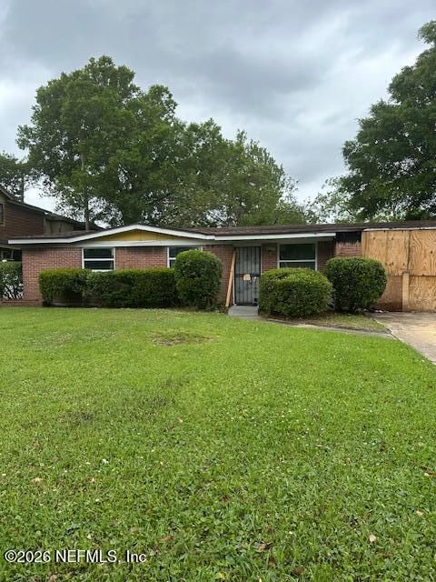 Photo of 9532 SCADLOCKE Road, Jacksonville, FL 32208 (MLS # 2139351)