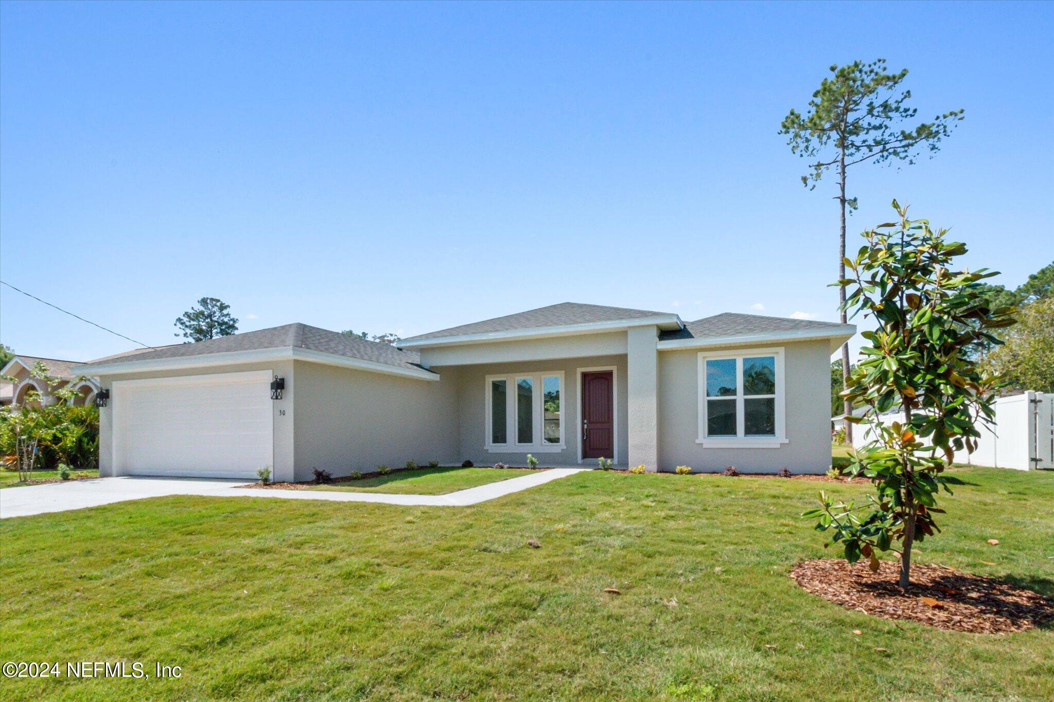 Palm Coast, FL home for sale located at 30 Brookside Lane, Palm Coast, FL 32137