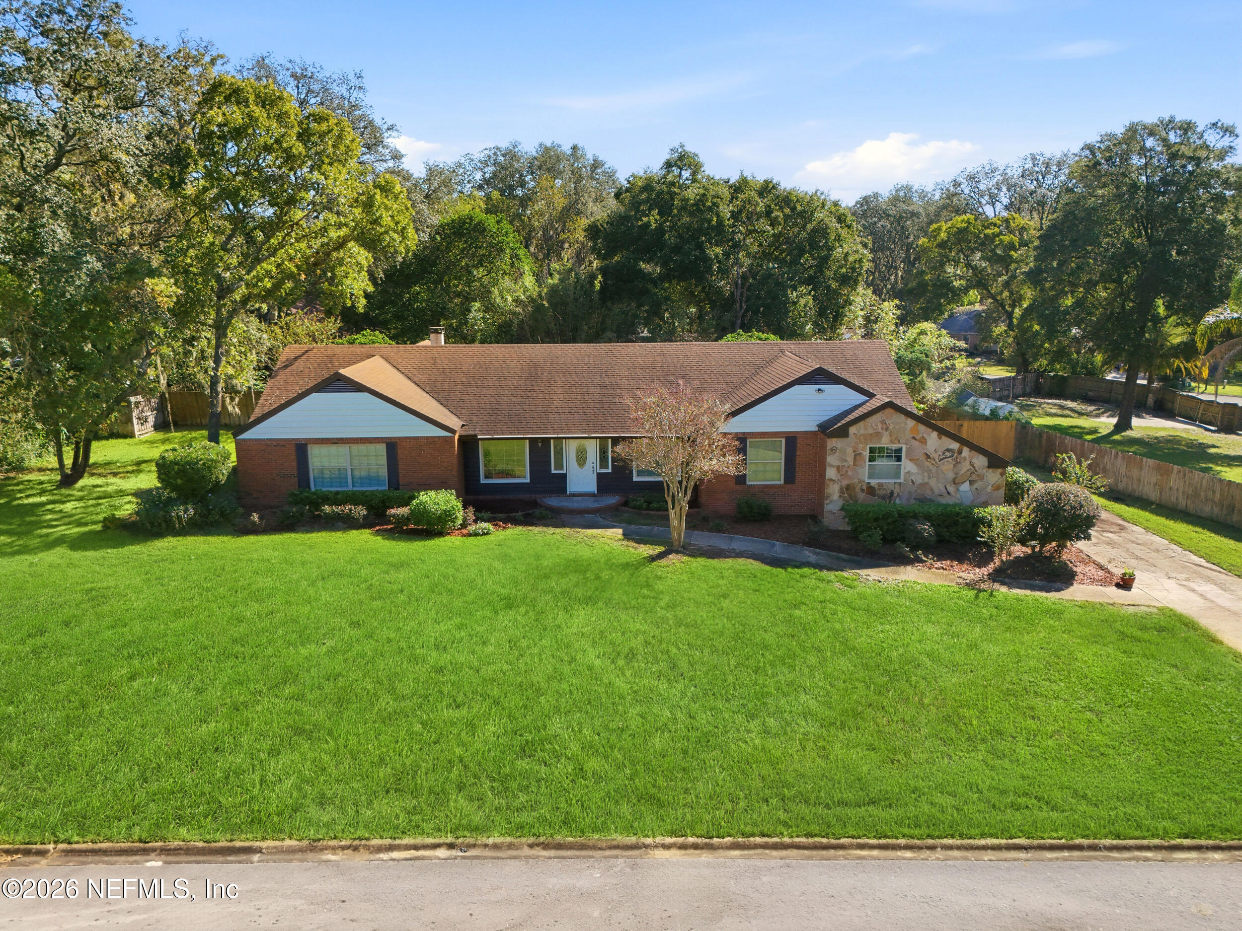6311 WHISPERING OAKS Drive W