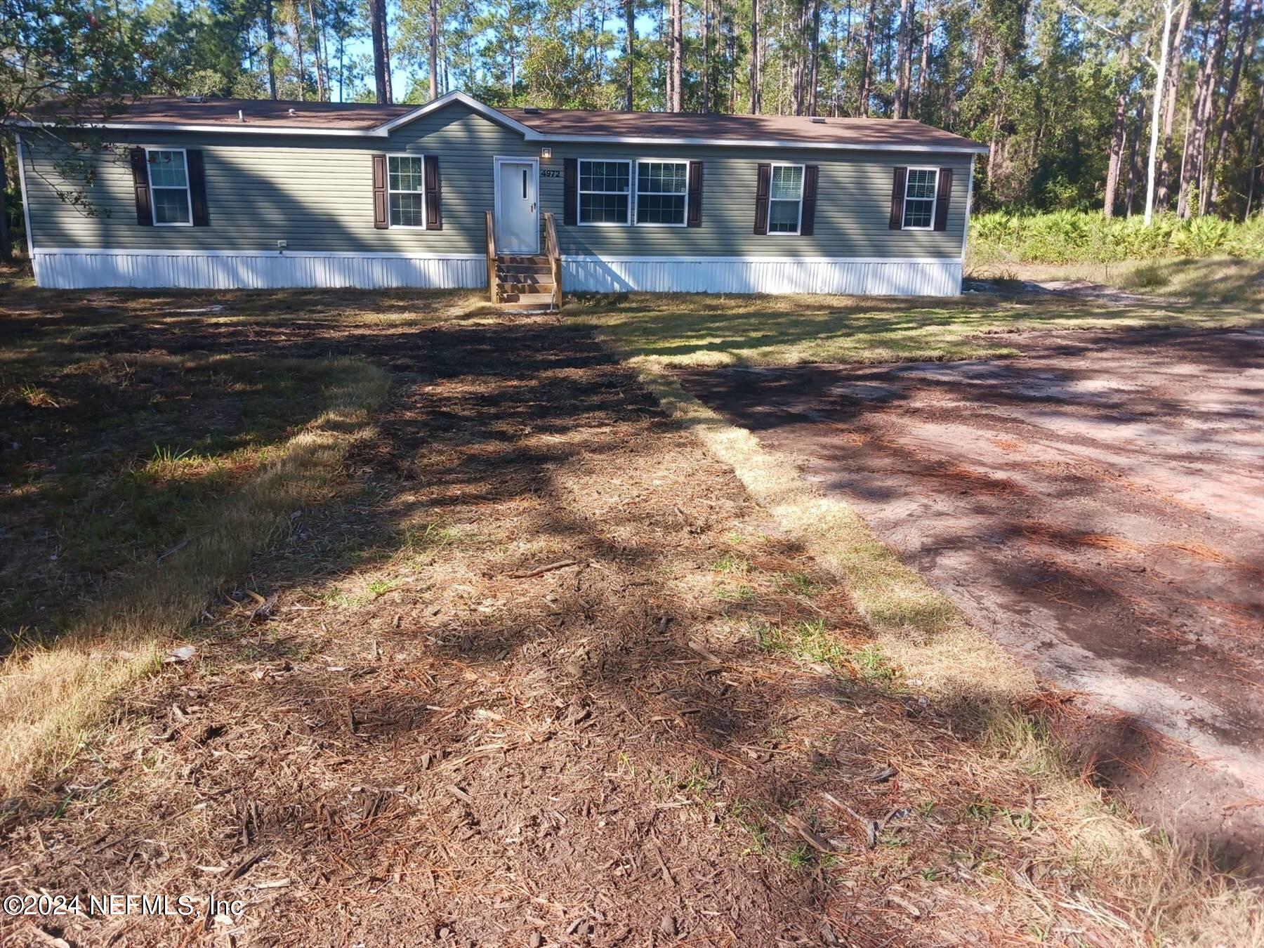 Bunnell, FL home for sale located at 4972 Walnut Avenue, Bunnell, FL 32110