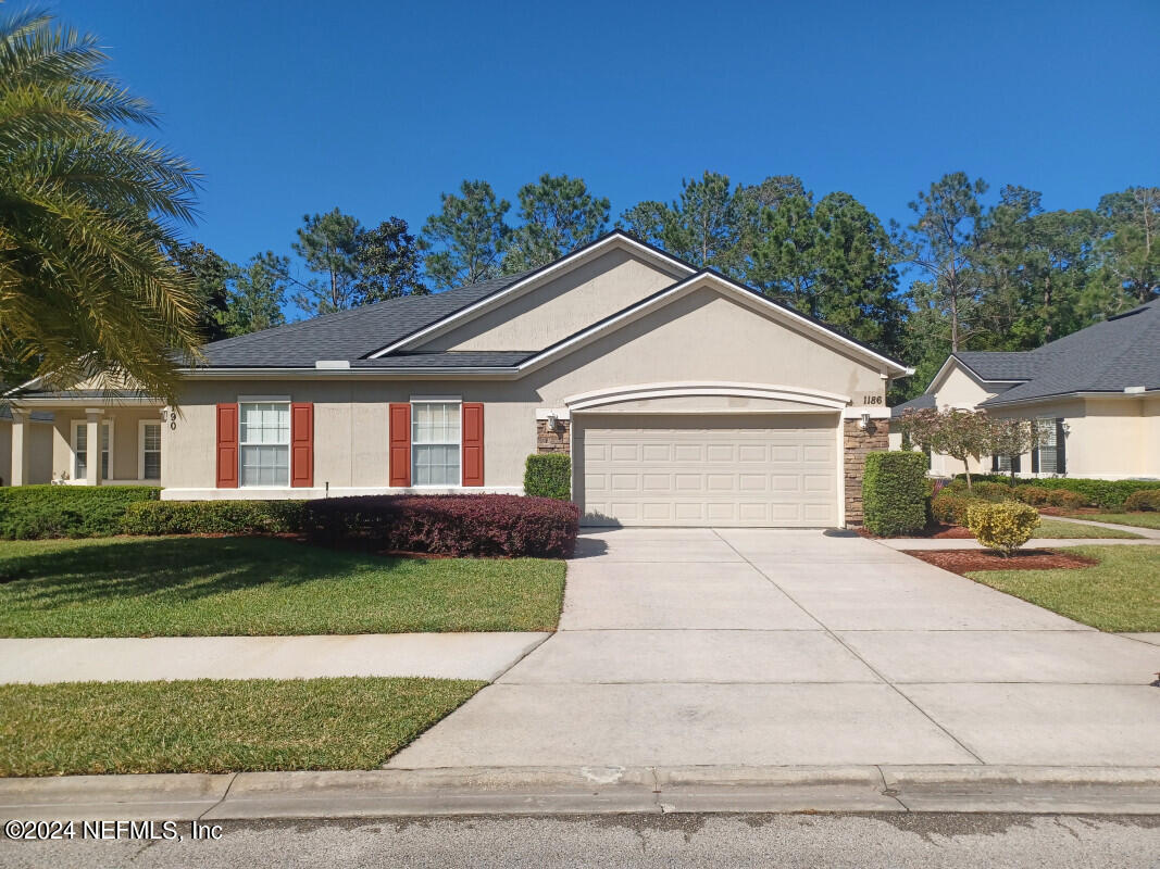Fleming Island, FL home for sale located at 1186 Wild Ginger Lane, Fleming Island, FL 32003