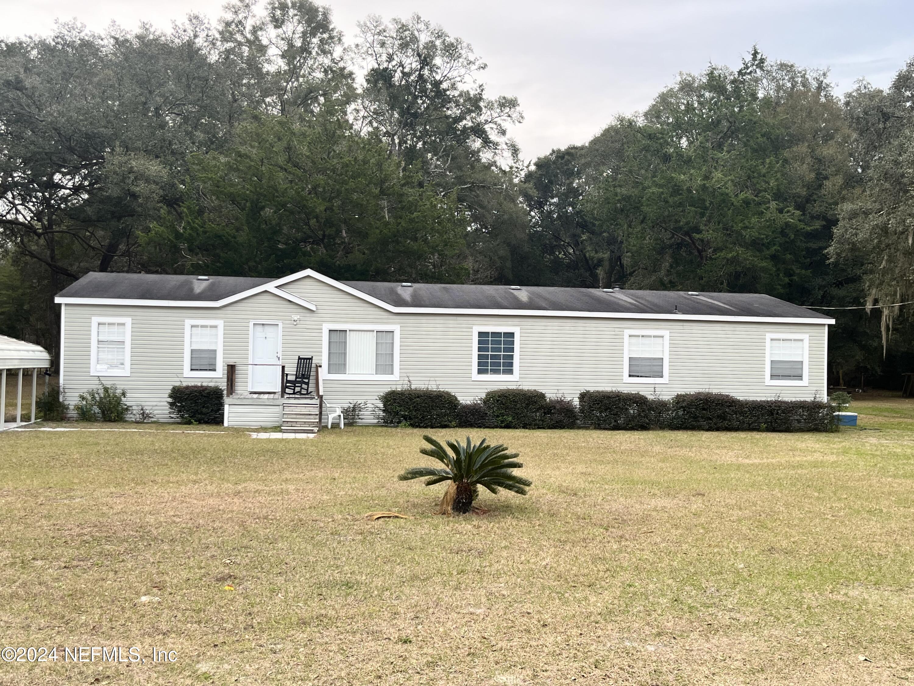 High Springs, FL home for sale located at 346 SE ADAMS Street, High Springs, FL 32643