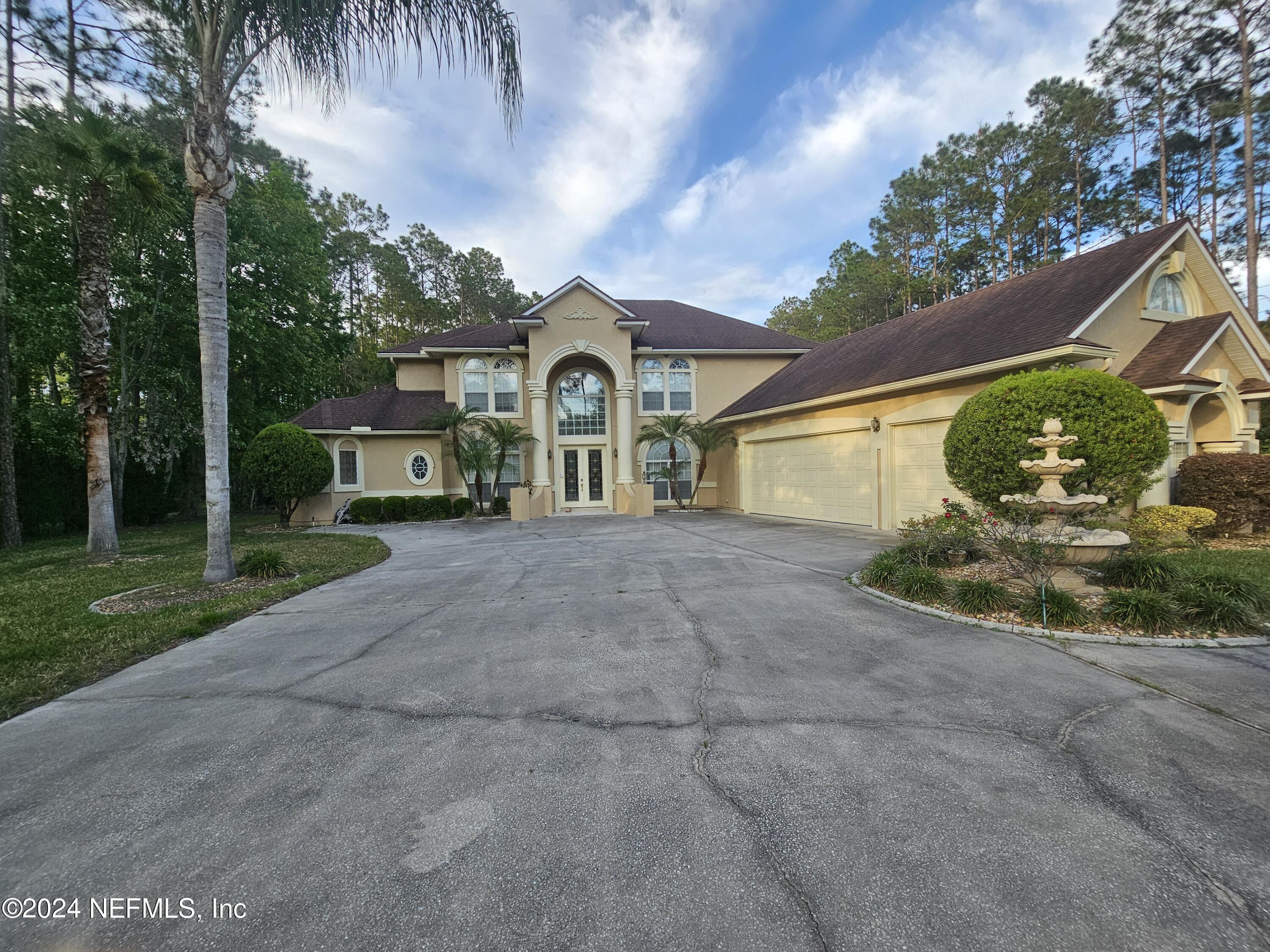St Johns, FL home for sale located at 100 Belmont Drive, St Johns, FL 32259