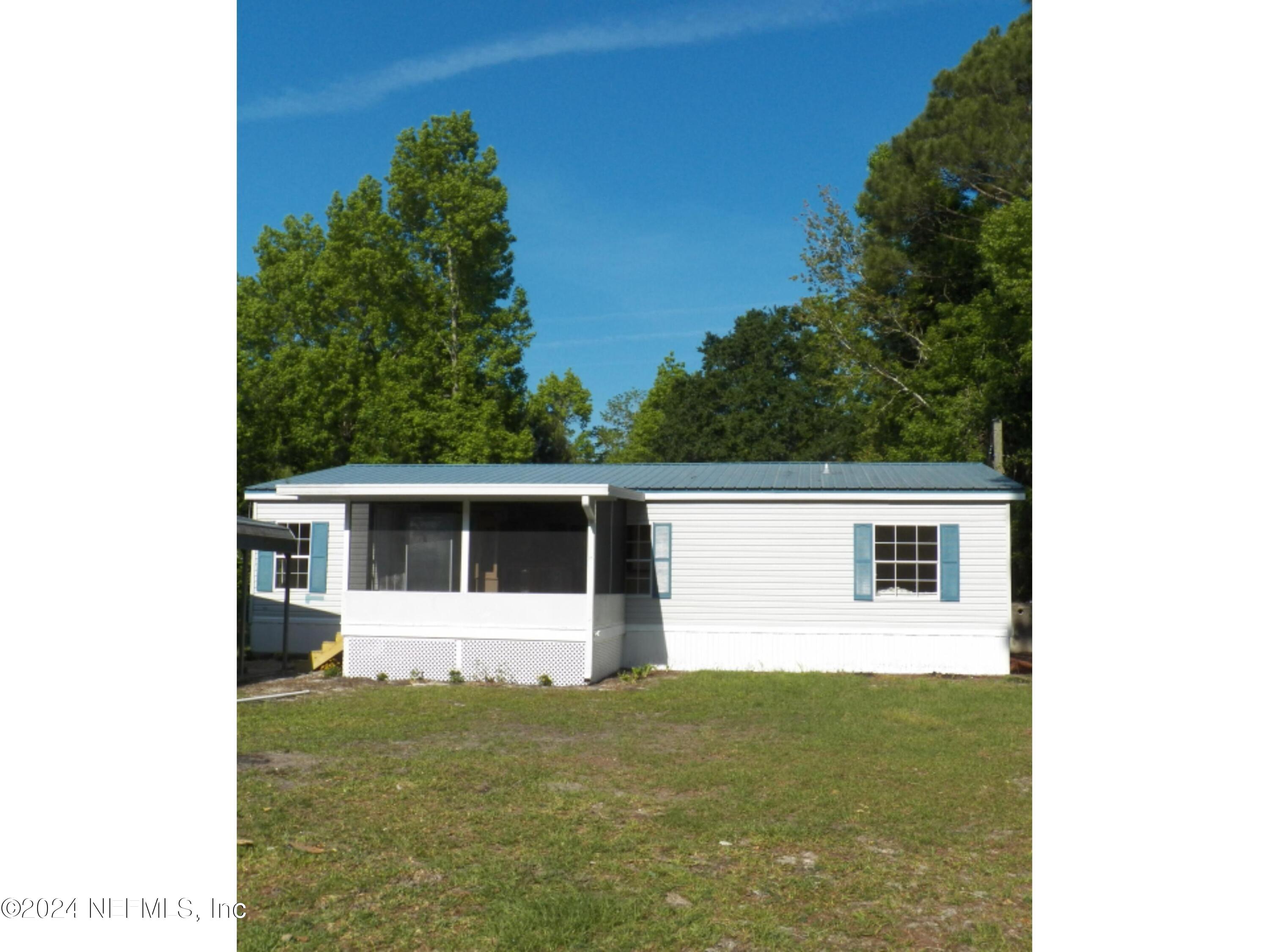 Yulee, FL home for sale located at 75285 Johnson Lake Drive, Yulee, FL 32097