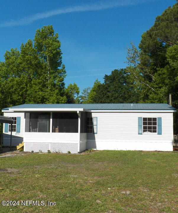 Yulee, FL home for sale located at 75285 Johnson Lake Drive, Yulee, FL 32097