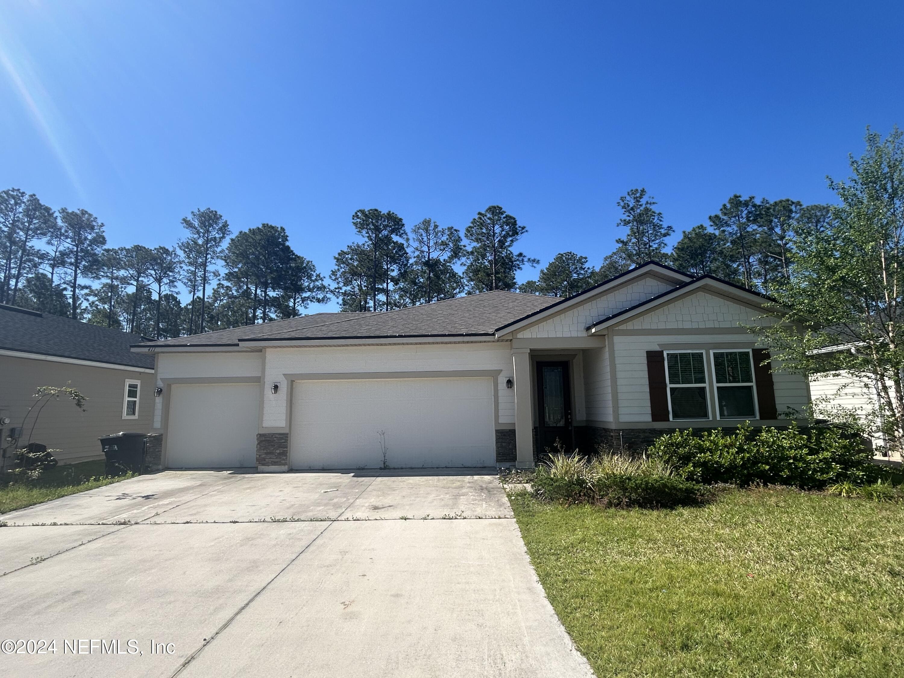 St Johns, FL home for sale located at 411 Rittburn Lane, St Johns, FL 32259
