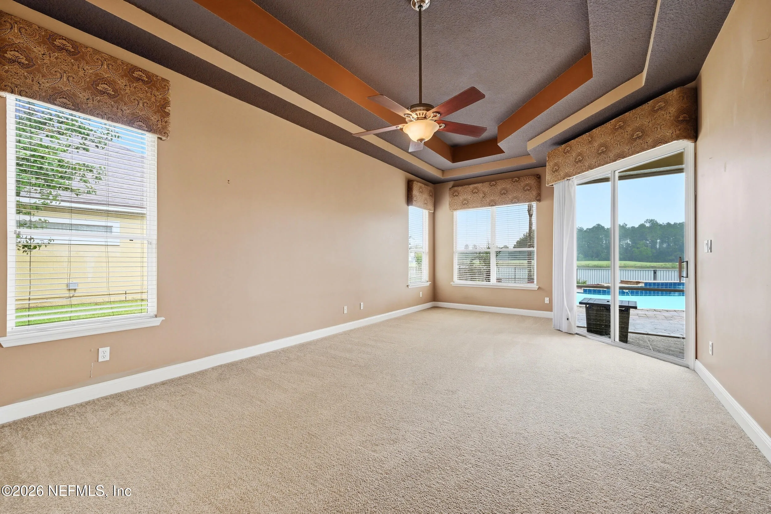 Tucked away on a rare .9-acre homesite in the sought-after South Hampt – image 16
