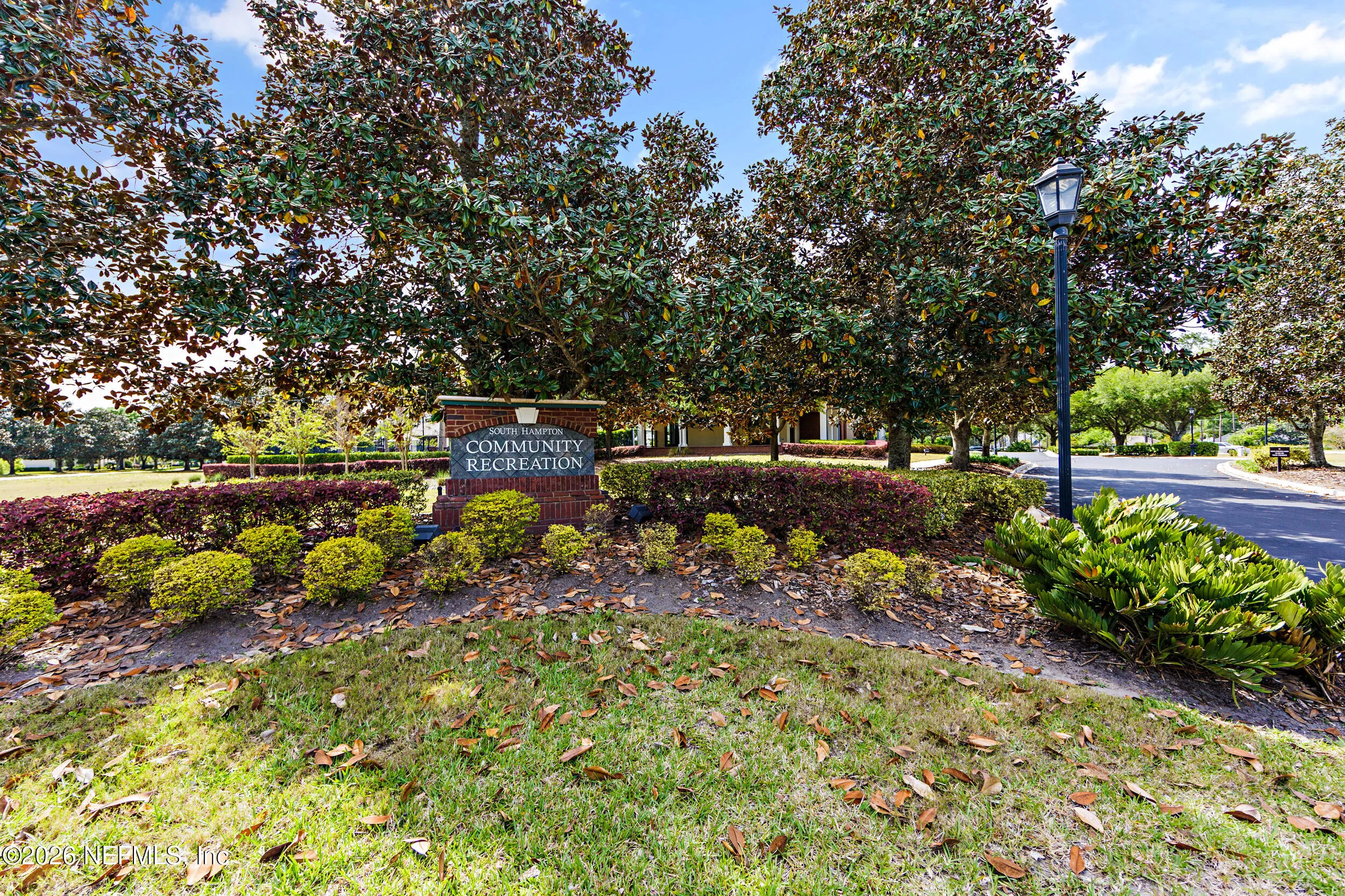Tucked away on a rare .9-acre homesite in the sought-after South Hampt – image 112