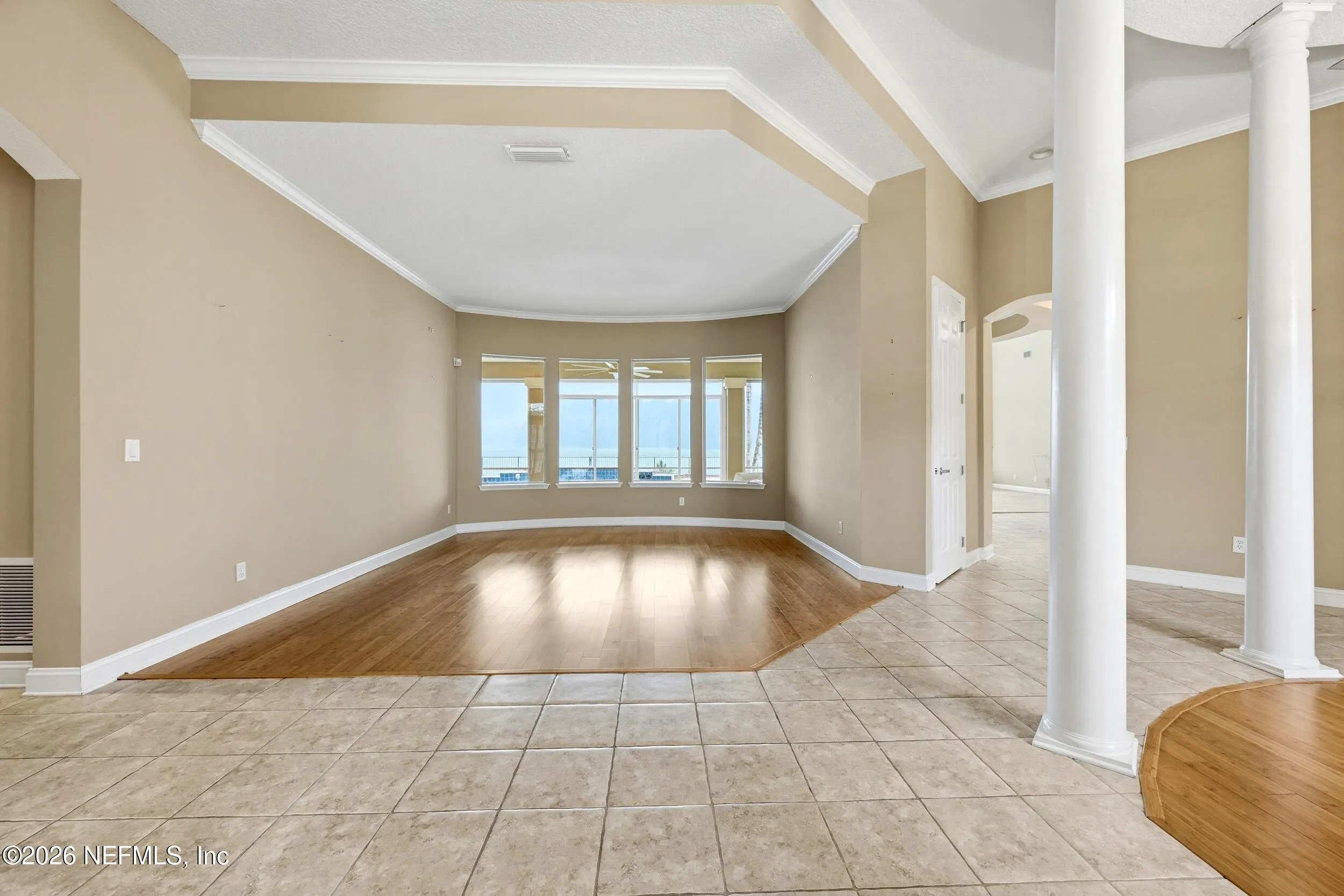 Tucked away on a rare .9-acre homesite in the sought-after South Hampt – image 4