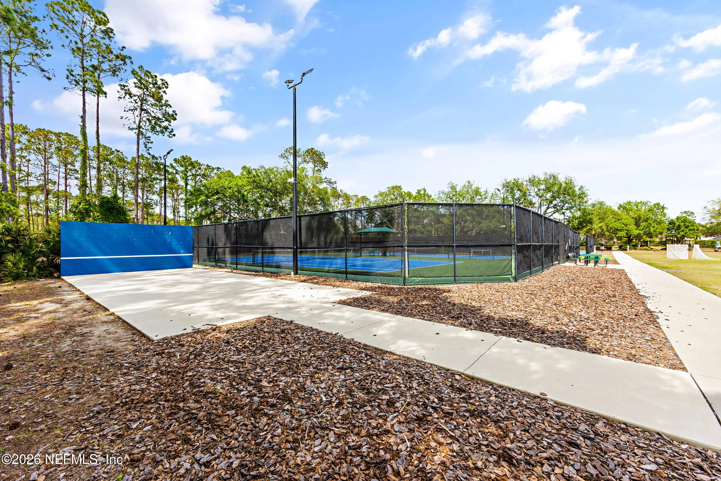 Tucked away on a rare .9-acre homesite in the sought-after South Hampt – image 111