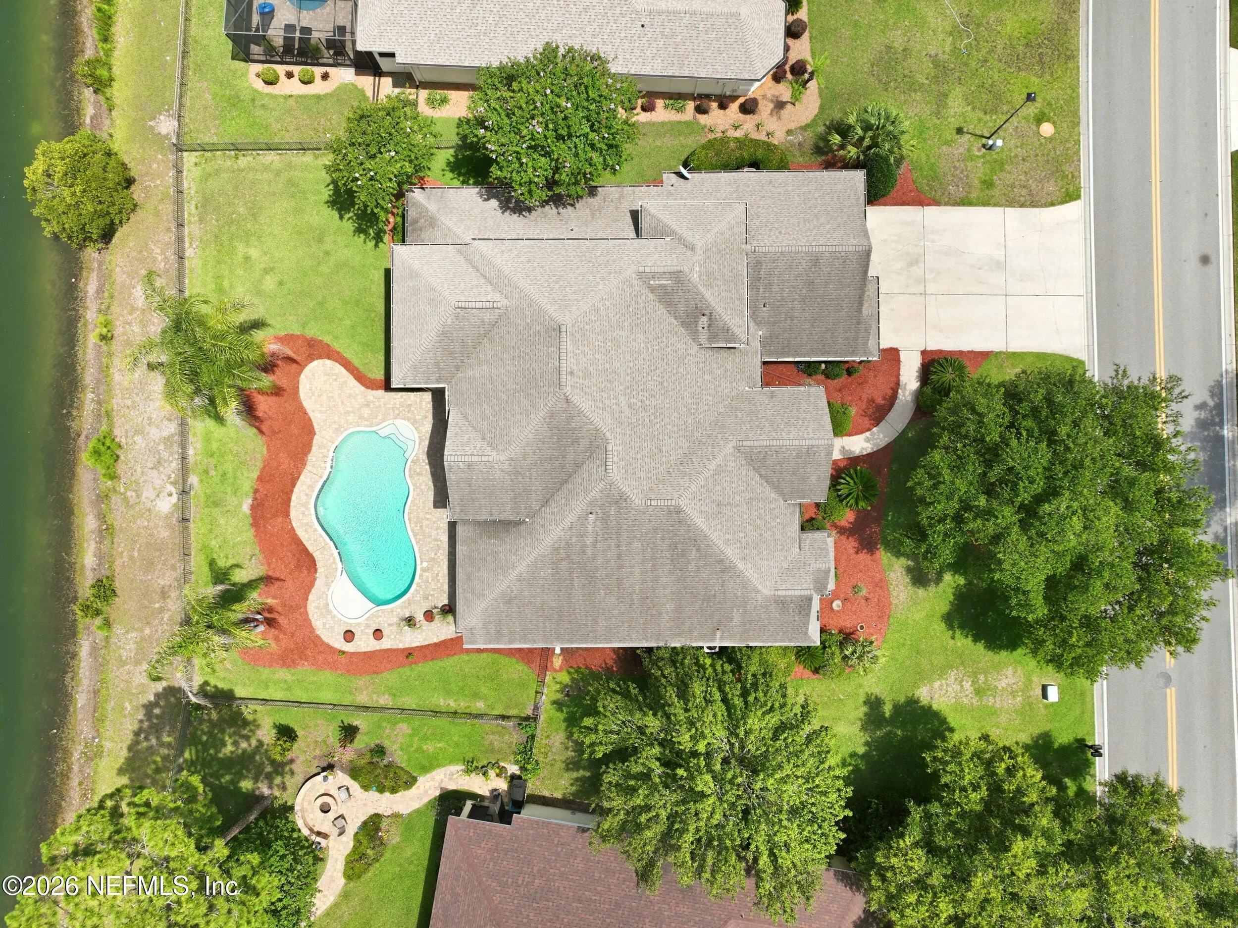 Tucked away on a rare .9-acre homesite in the sought-after South Hampt – image 97