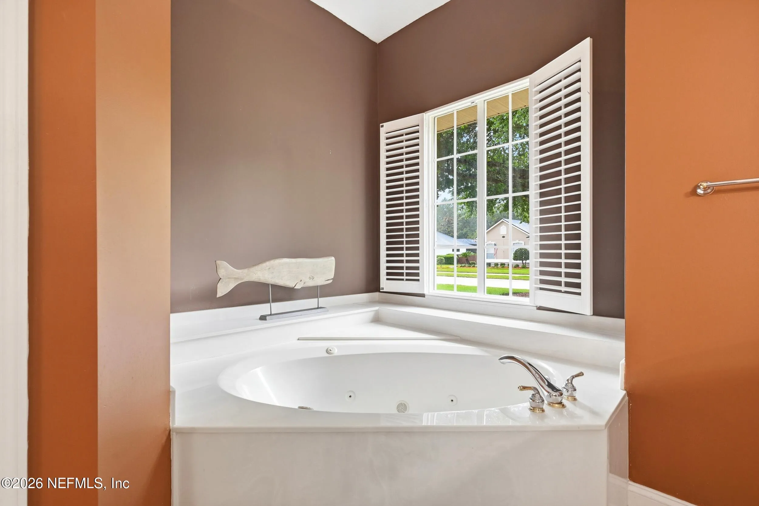 Tucked away on a rare .9-acre homesite in the sought-after South Hampt – image 24
