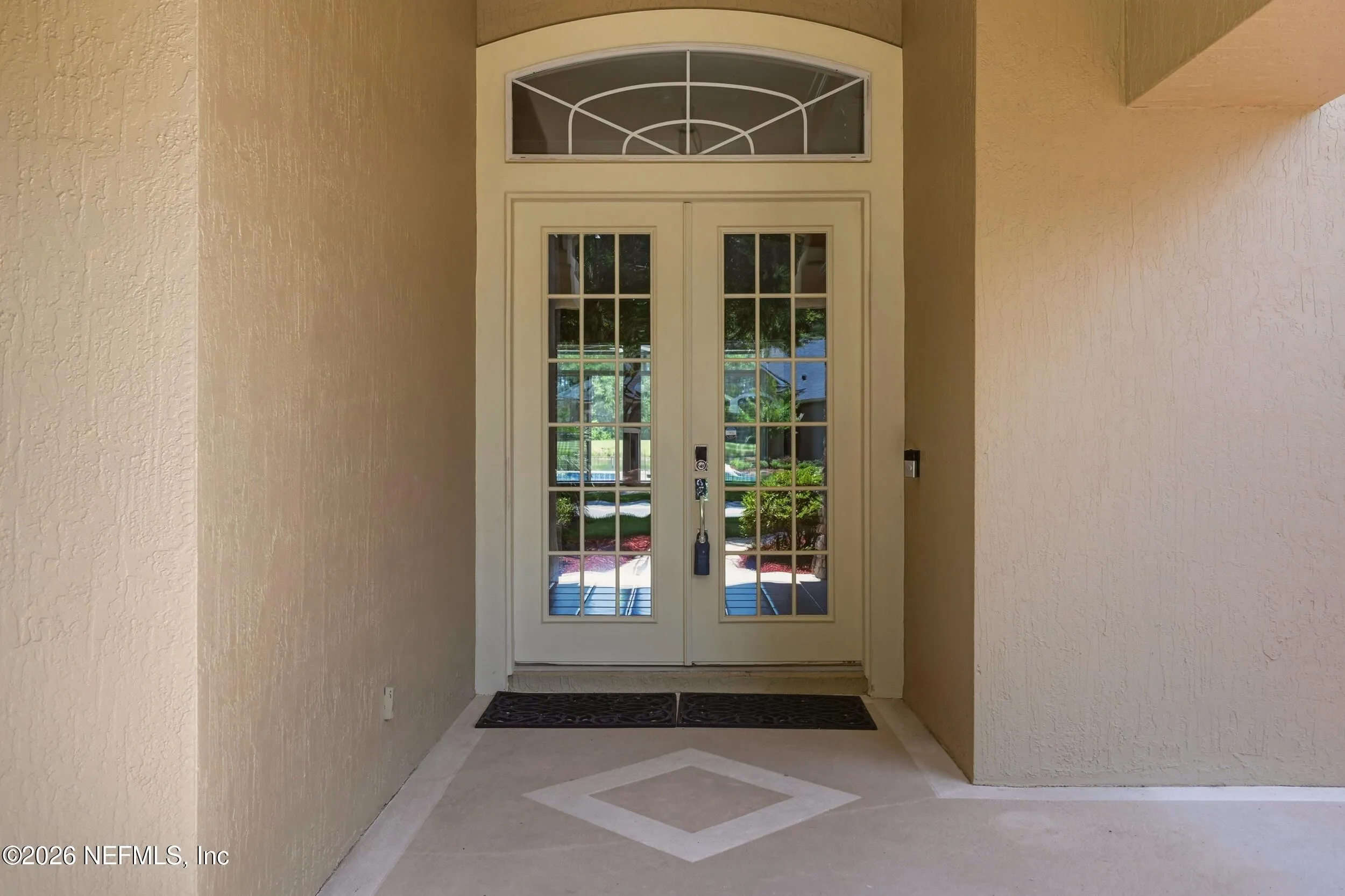 Tucked away on a rare .9-acre homesite in the sought-after South Hampt – image 3