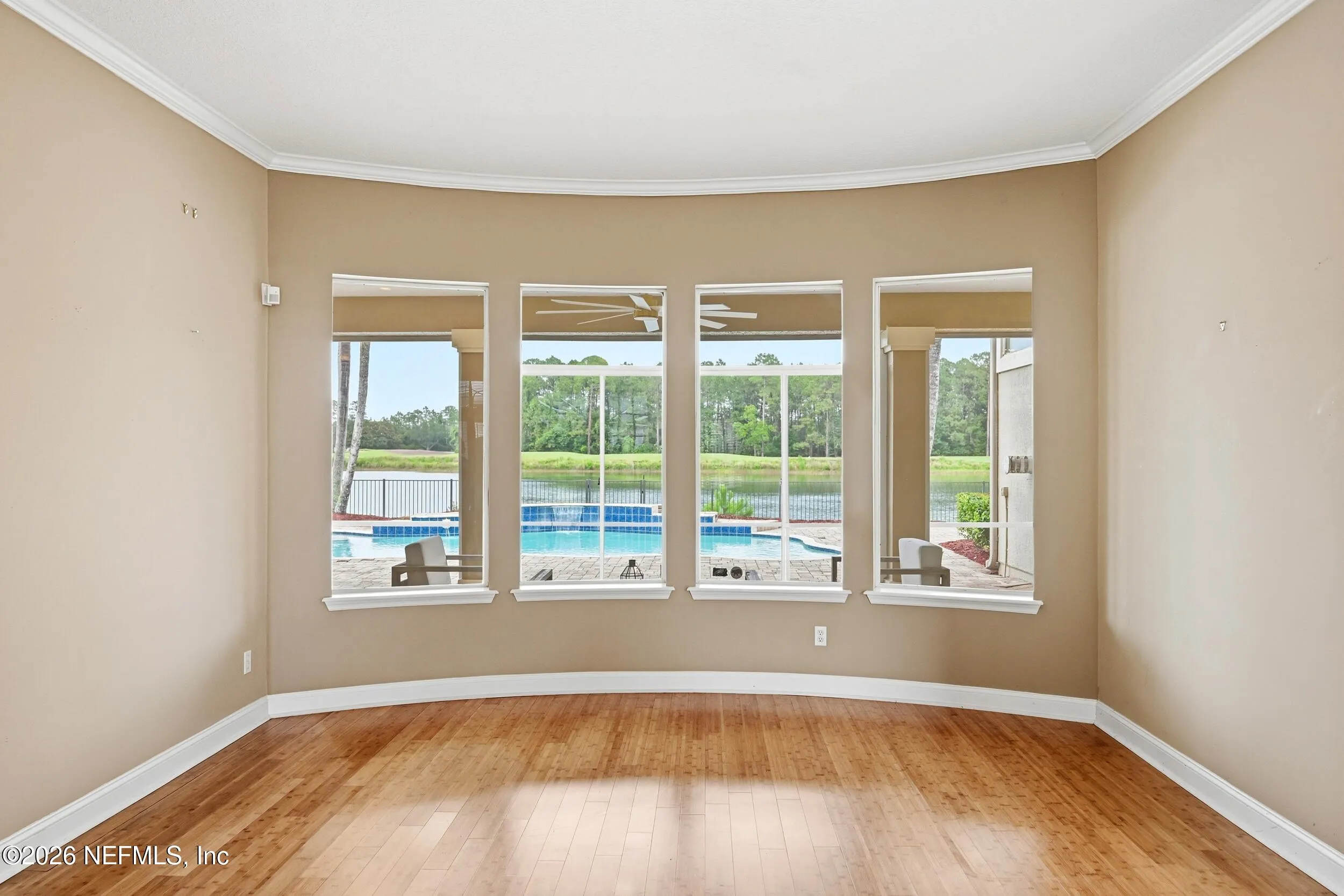 Tucked away on a rare .9-acre homesite in the sought-after South Hampt – image 13