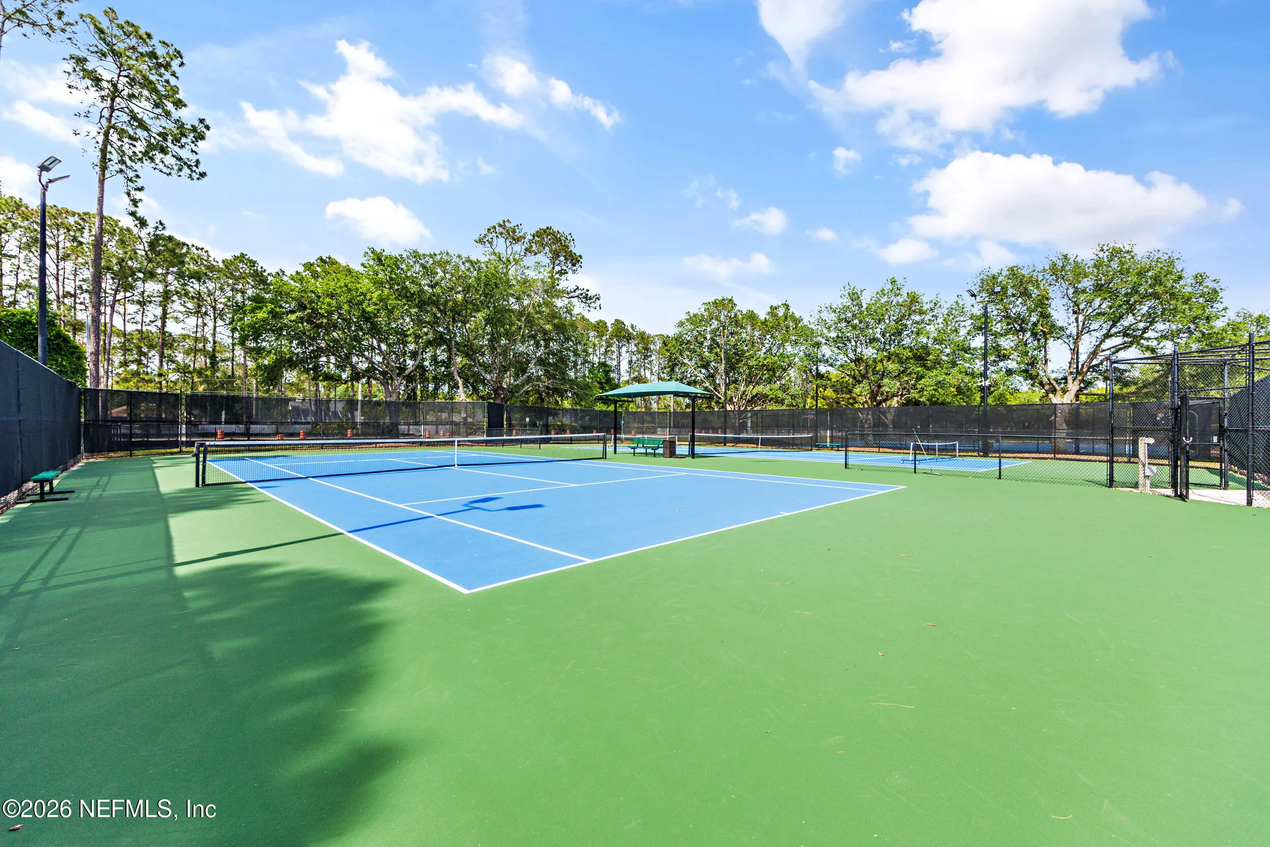 Tucked away on a rare .9-acre homesite in the sought-after South Hampt – image 110