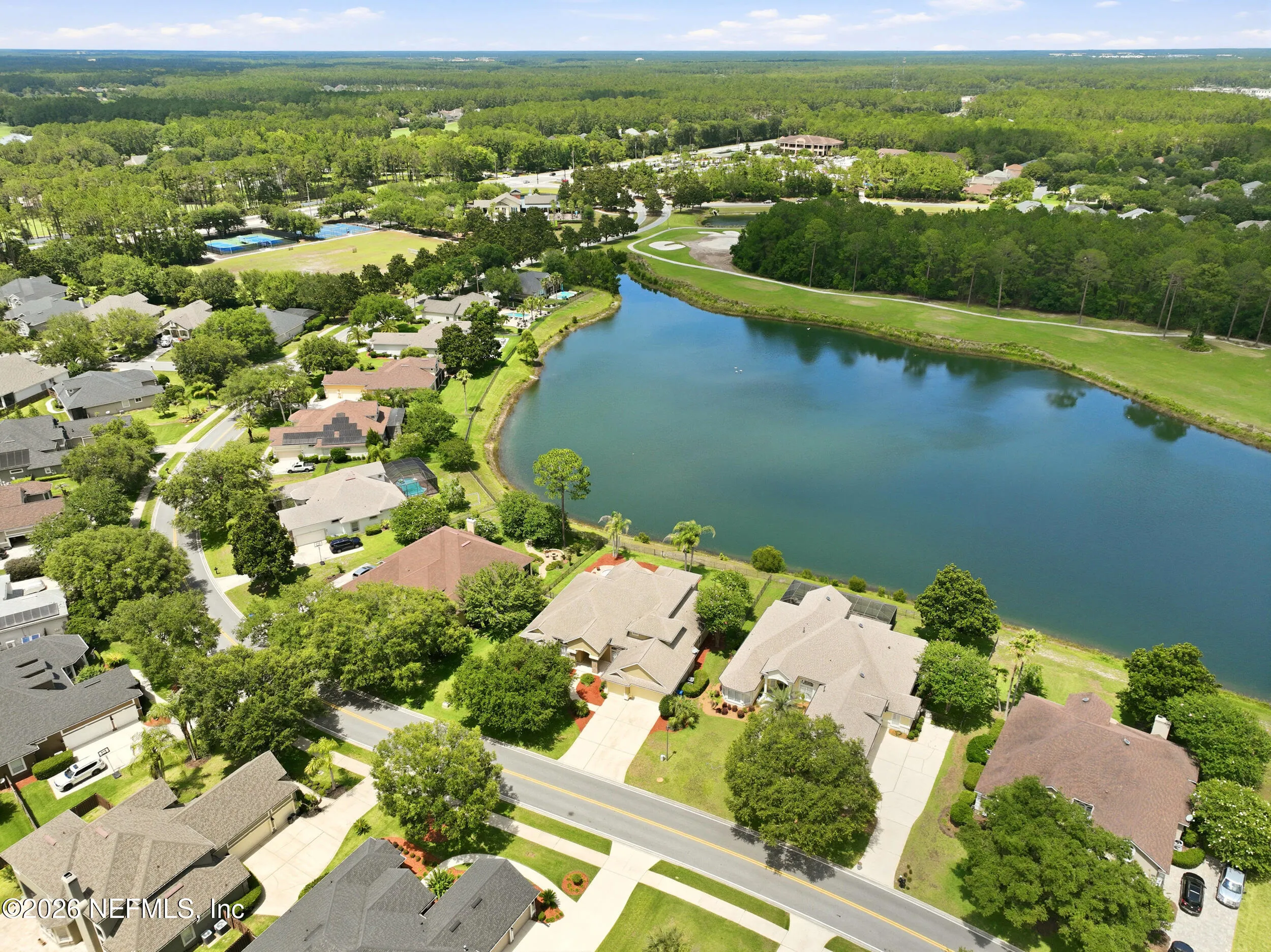 Tucked away on a rare .9-acre homesite in the sought-after South Hampt – image 95