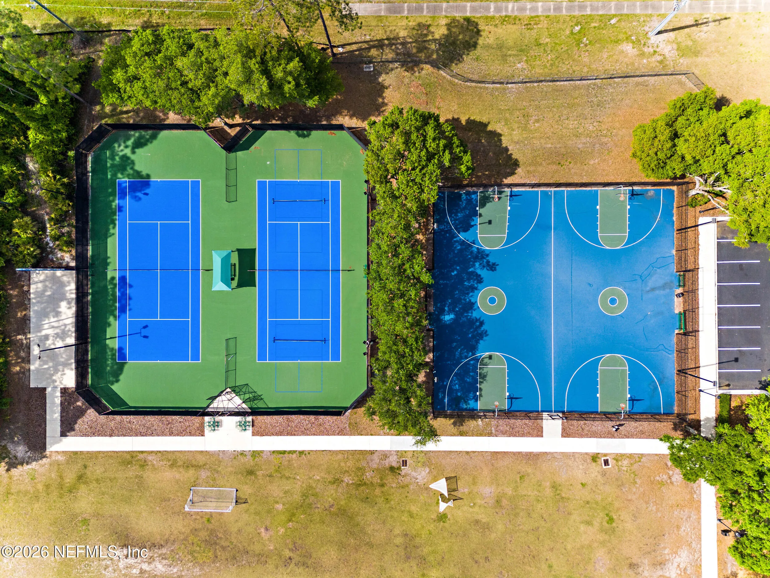Tucked away on a rare .9-acre homesite in the sought-after South Hampt – image 126