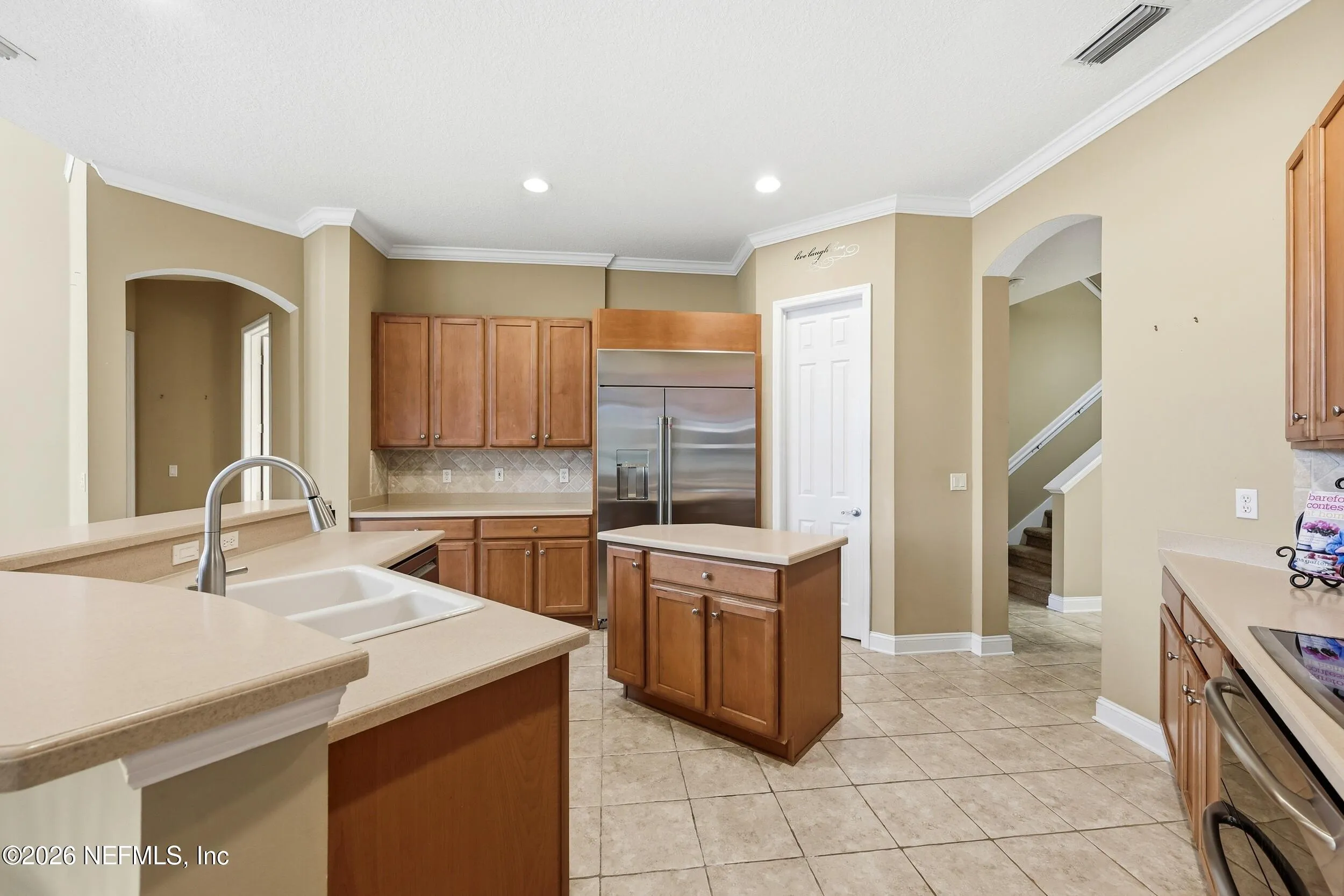Tucked away on a rare .9-acre homesite in the sought-after South Hampt – image 28