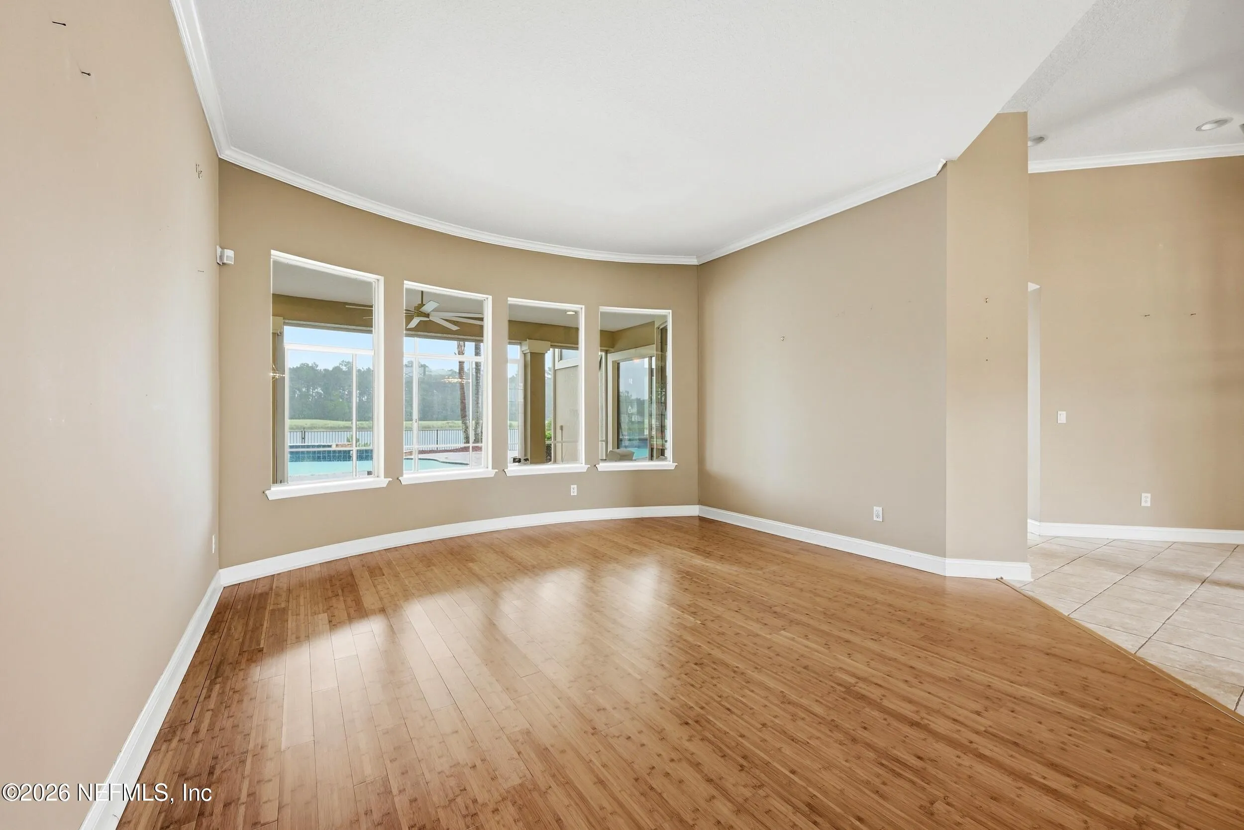 Tucked away on a rare .9-acre homesite in the sought-after South Hampt – image 12