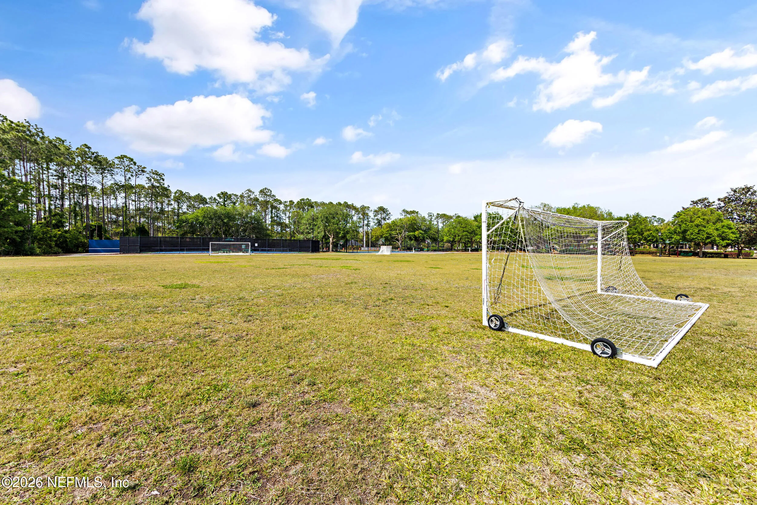 Tucked away on a rare .9-acre homesite in the sought-after South Hampt – image 118
