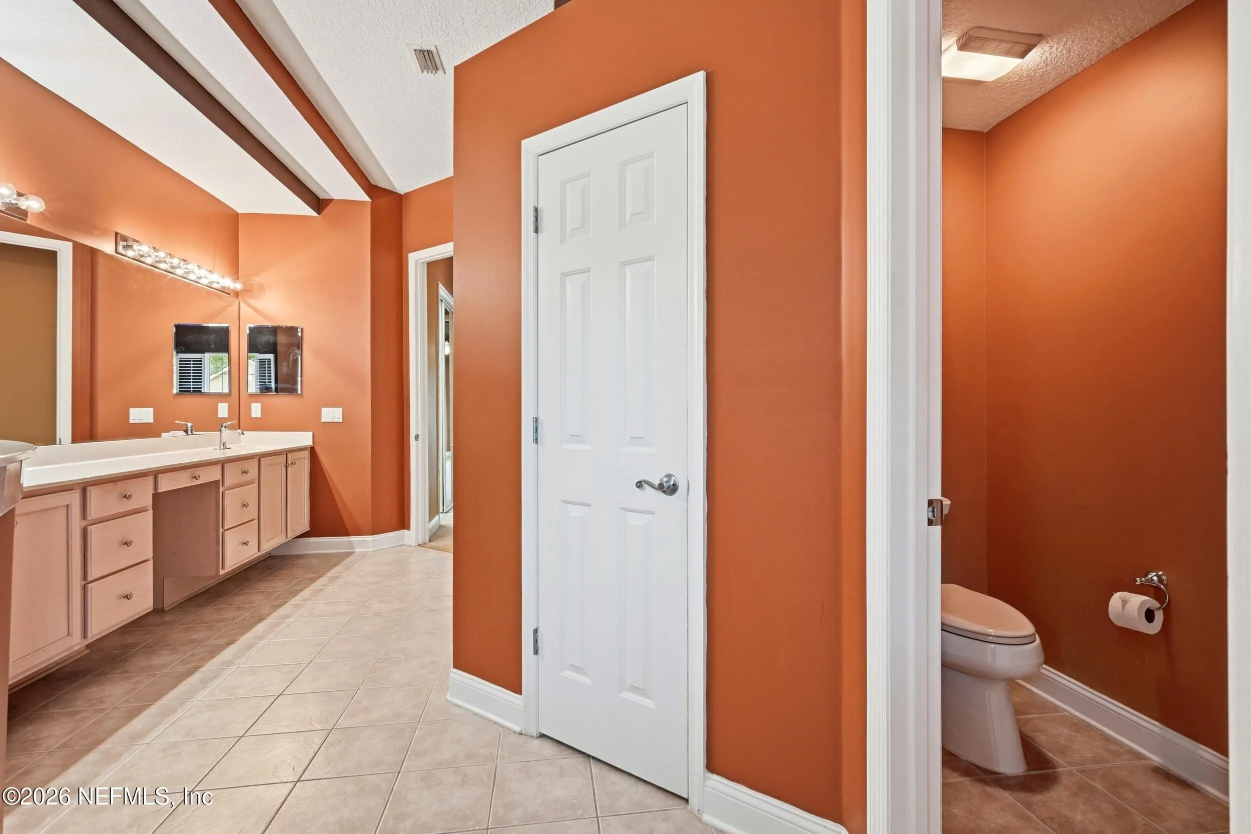 Tucked away on a rare .9-acre homesite in the sought-after South Hampt – image 27