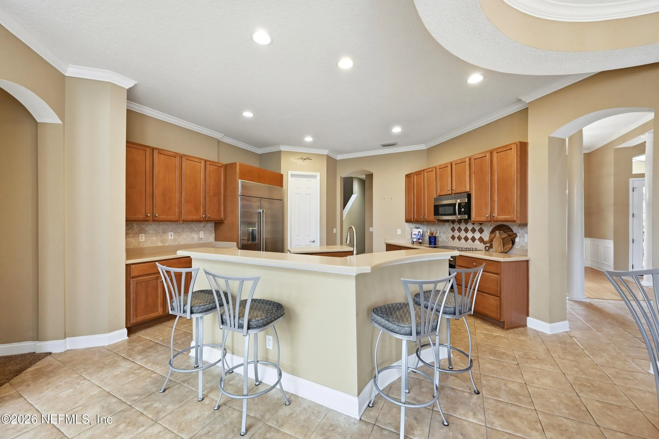 Tucked away on a rare .9-acre homesite in the sought-after South Hampt – image 36