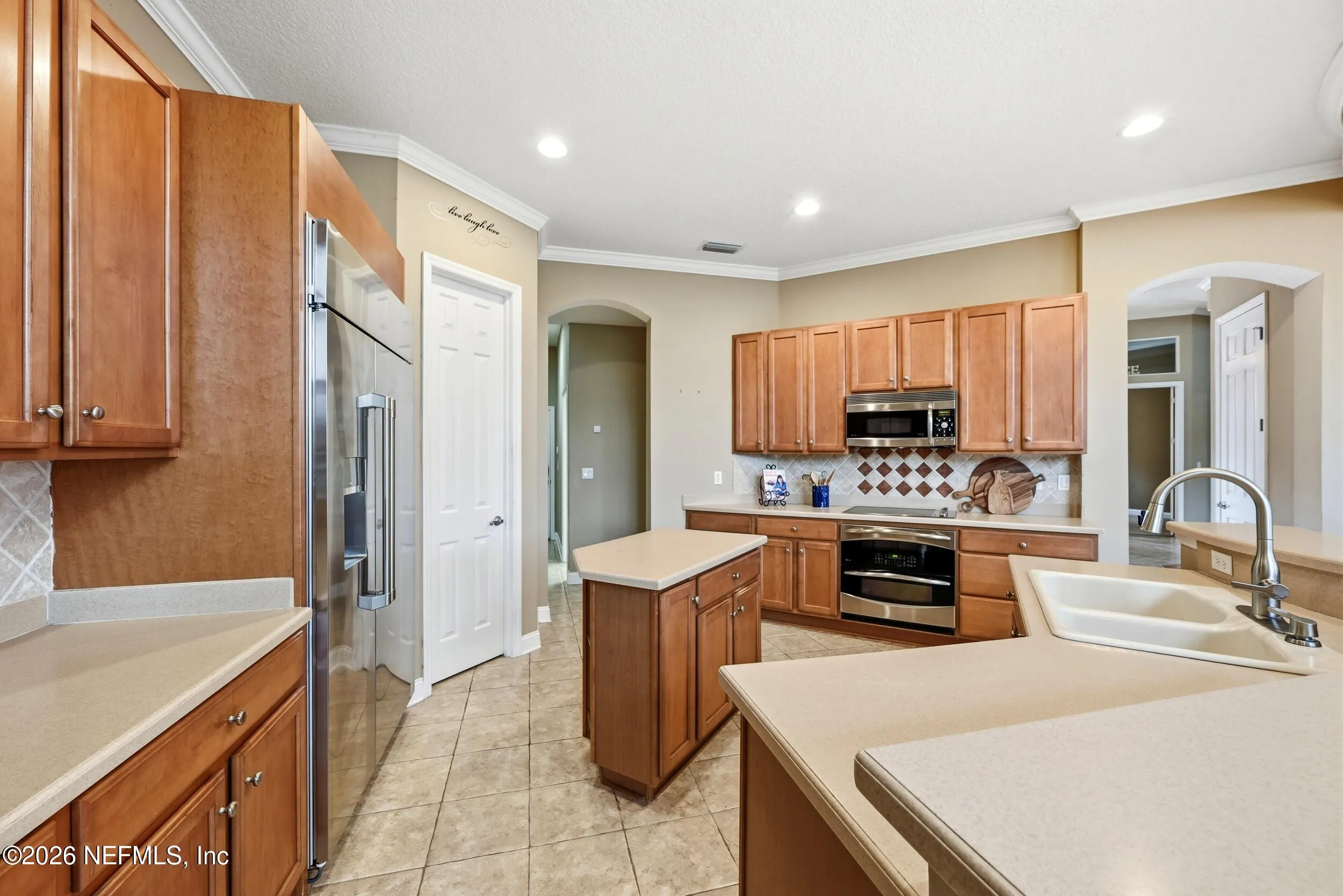 Tucked away on a rare .9-acre homesite in the sought-after South Hampt – image 29