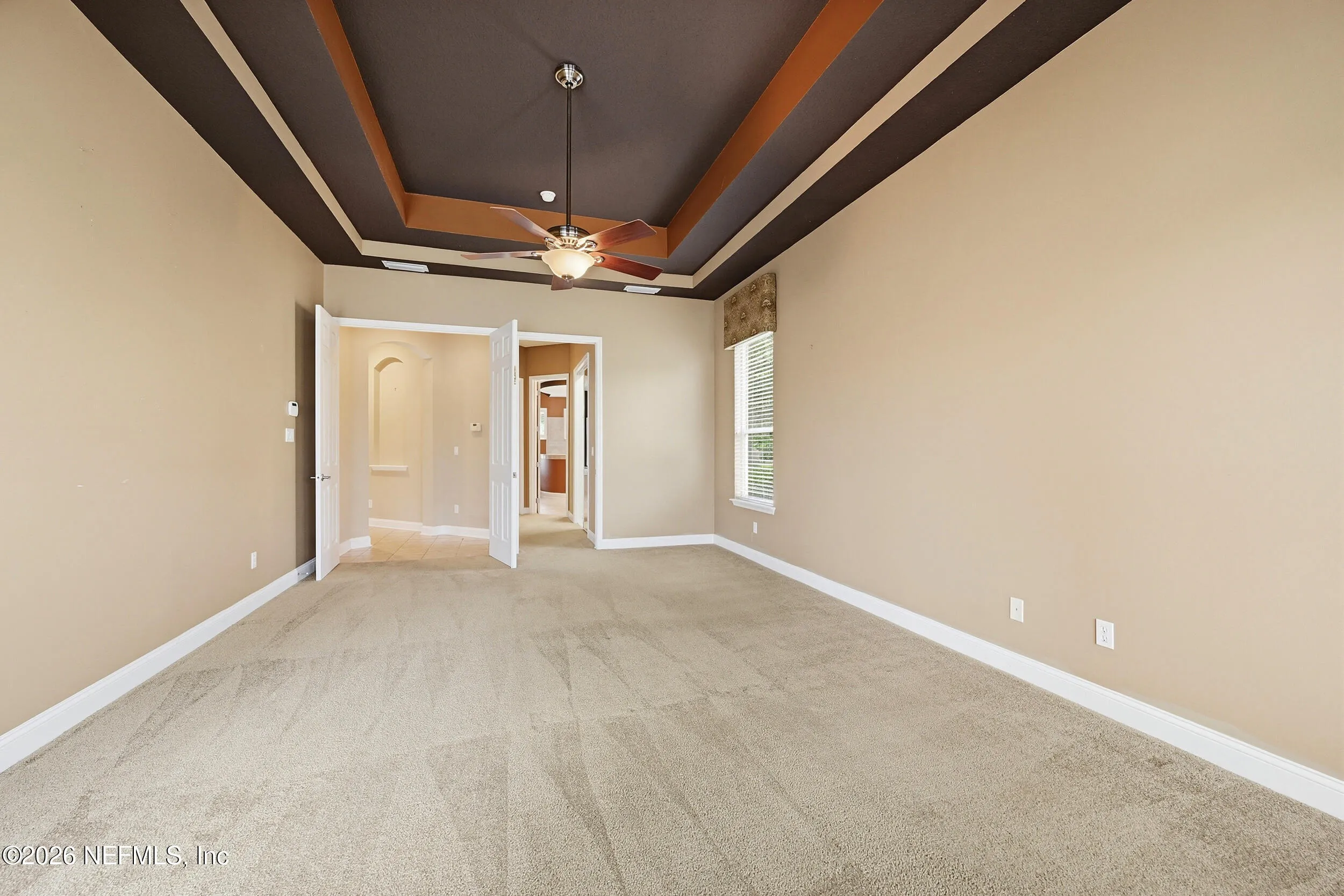 Tucked away on a rare .9-acre homesite in the sought-after South Hampt – image 19