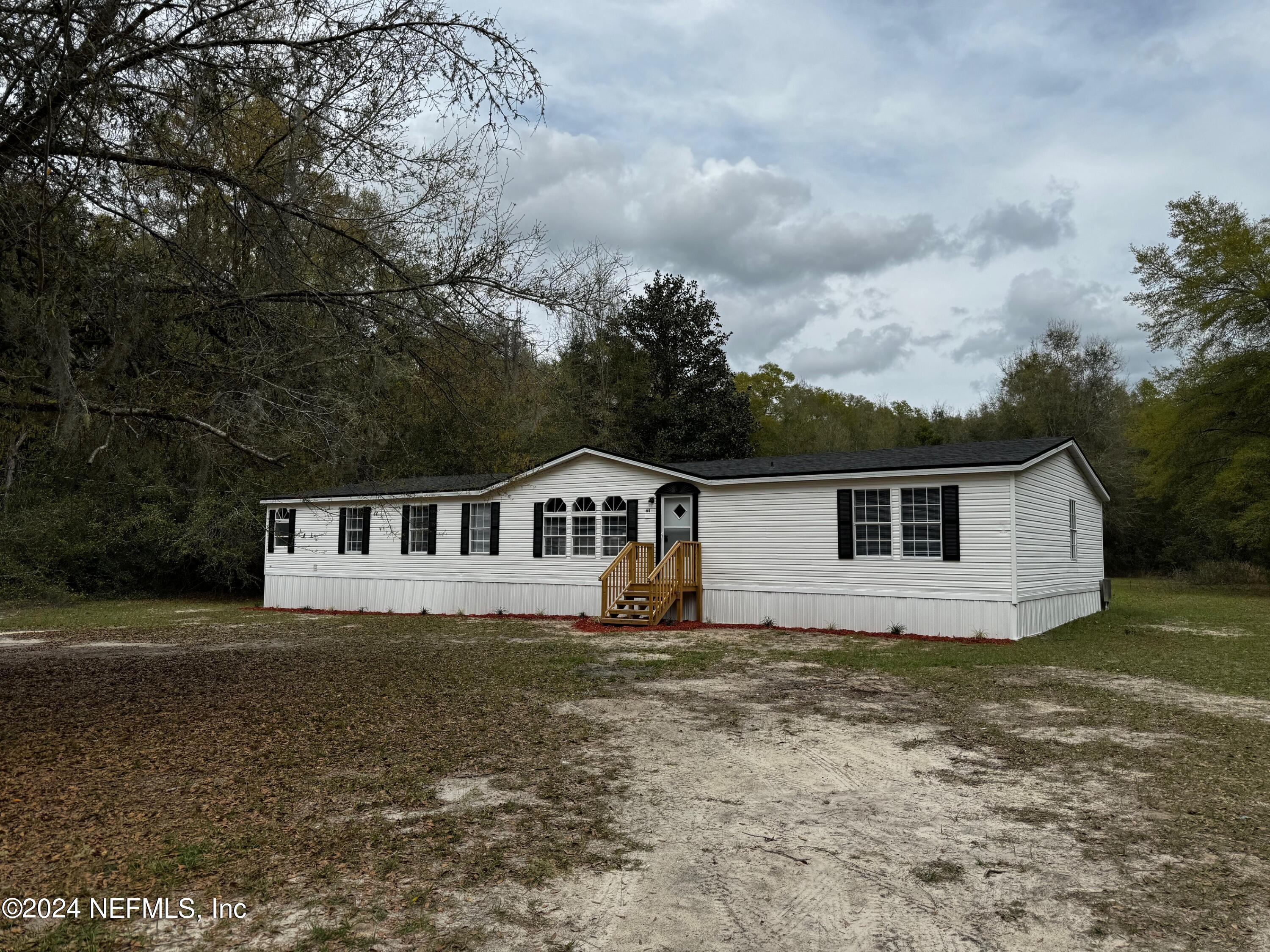 Florahome, FL home for sale located at 156 TANNER SCHOOL BUS Road, Florahome, FL 32140
