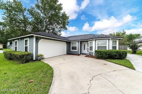 Photo of 7119 SWAMP FLOWER Drive N, Jacksonville, FL 32244 (MLS # 2143713)