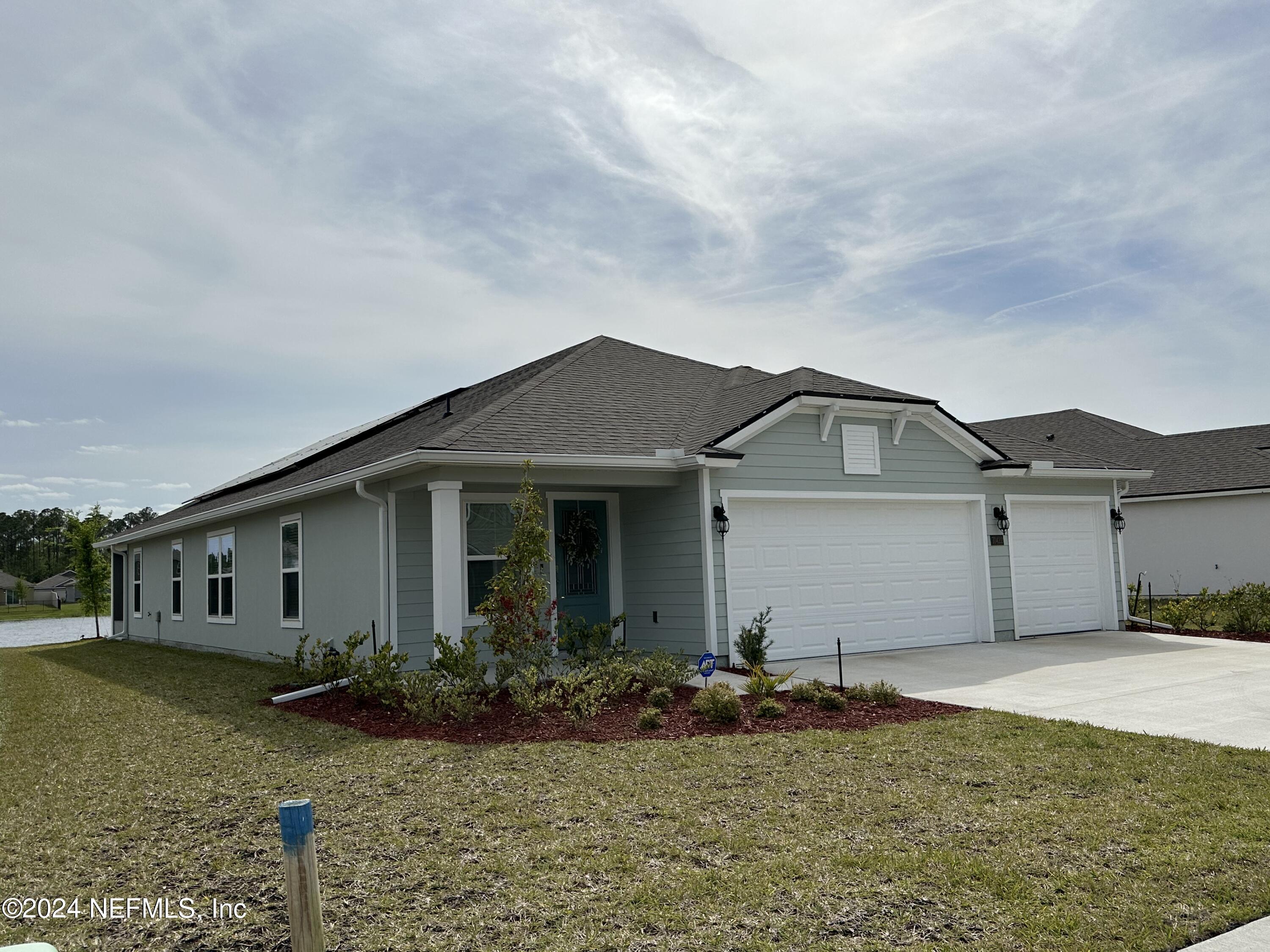 Yulee, FL home for sale located at 70422 Winding River Drive, Yulee, FL 32097