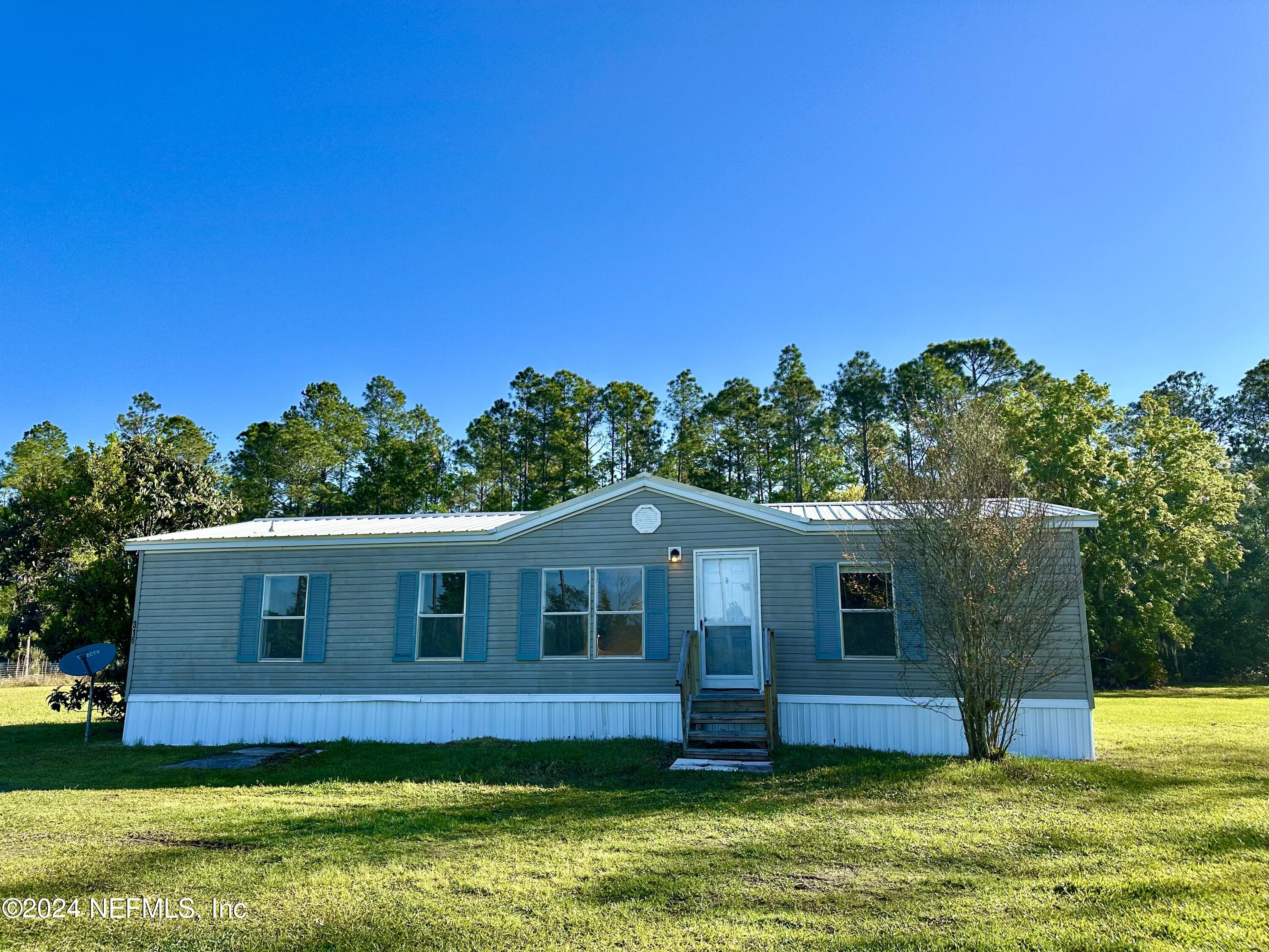 Palatka, FL home for sale located at 316 MILLICAN Road, Palatka, FL 32177