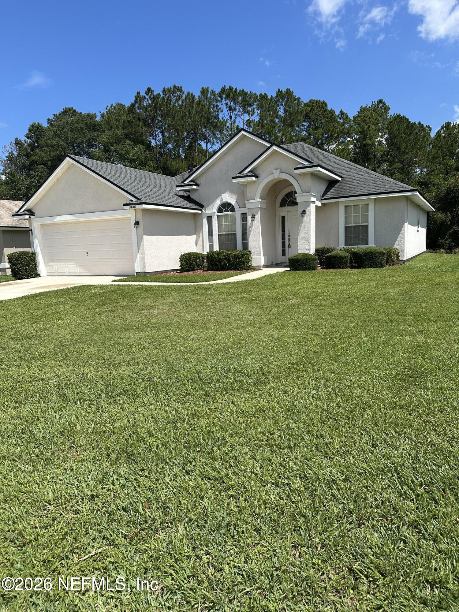 Photo 1 of 18 — 1658 NORTHGLEN Circle, Middleburg, FL 32068