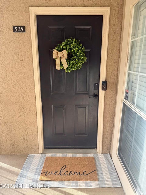 Photo of 10961 BURNT MILL Road #528, Jacksonville, FL 32256 (MLS # 2156272)