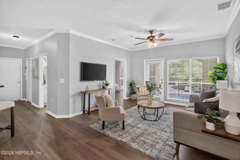 Photo of 10961 BURNT MILL Road #423, Jacksonville, FL 32256 (MLS # 2159607)