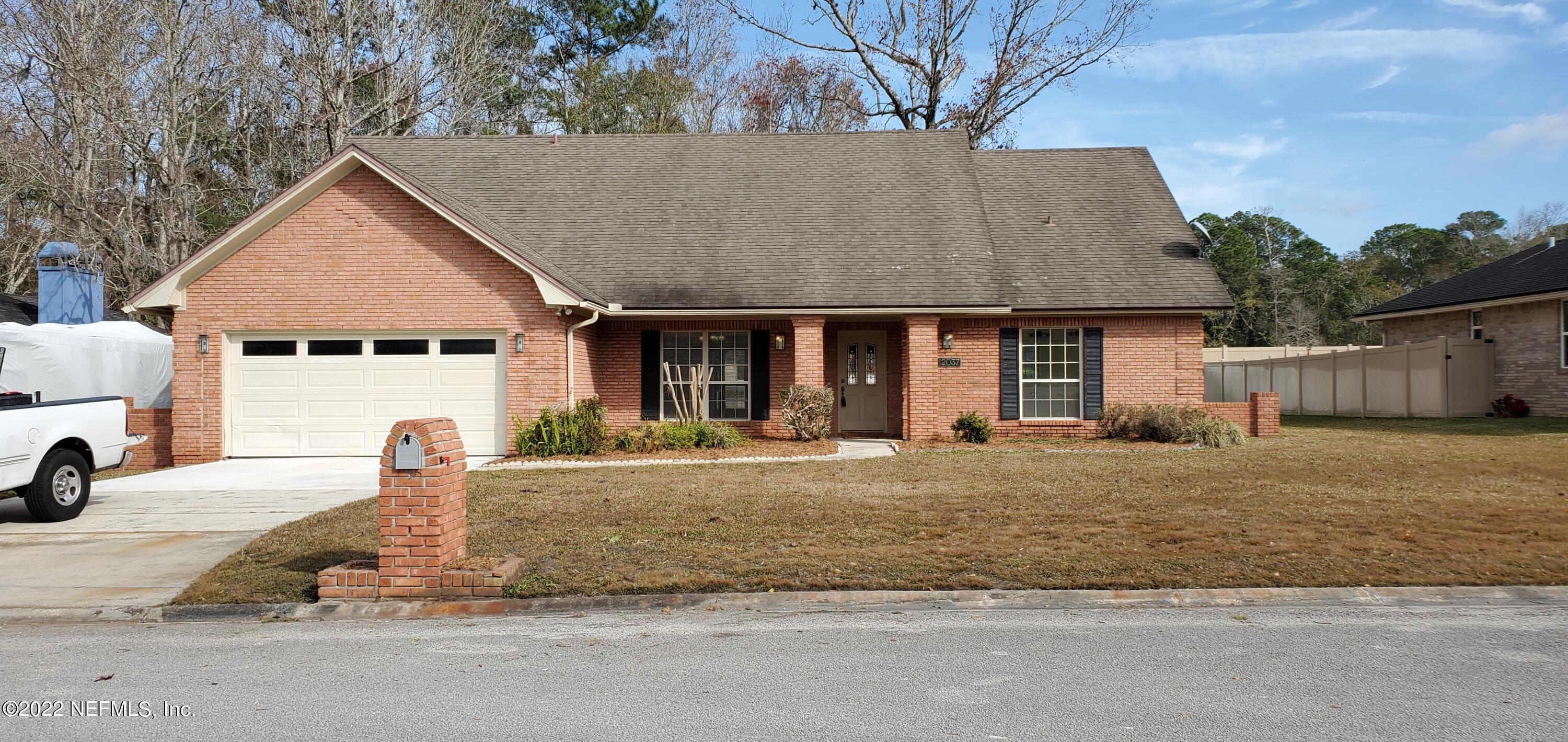 Jacksonville, FL home for sale located at 12037 HAMMOCK OAKS Drive, Jacksonville, FL 32223