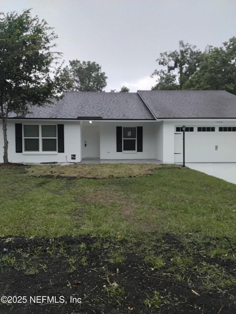 Photo of 1662 SANDY HOLLOW Loop, Middleburg, FL 32068 (MLS # 2145371)