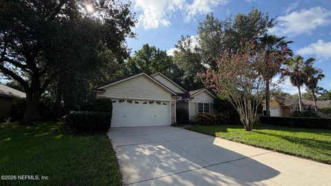 Photo of 1485 MARSH RABBIT Way, Fleming Island, FL 32003 (MLS # 2152388)