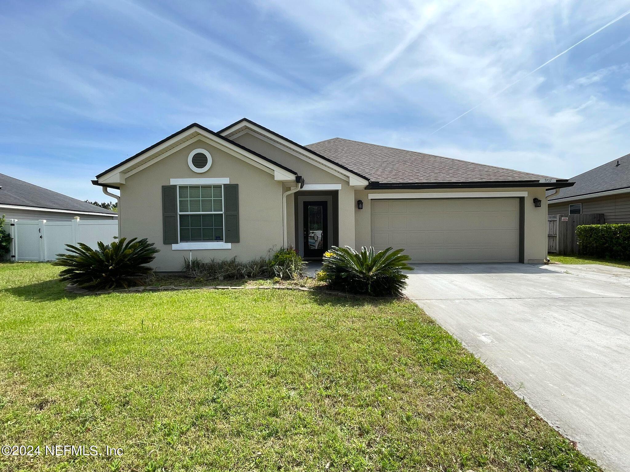 Jacksonville, FL home for sale located at 9712 Woodstone Mill Drive, Jacksonville, FL 32244